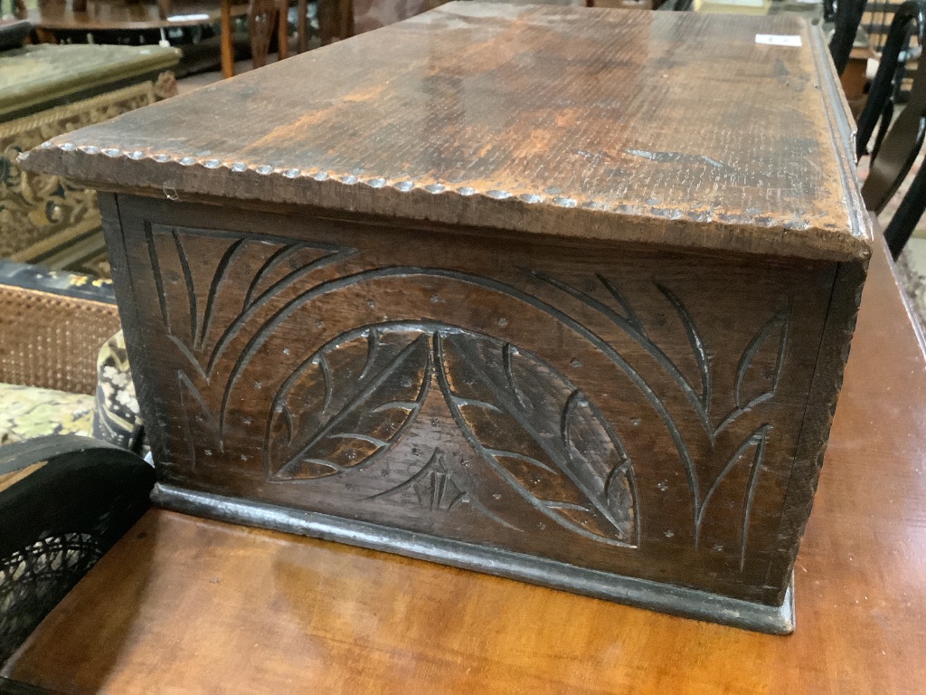 An early 18th century carved oak bible box, width 56cm depth 36cm height 20cm